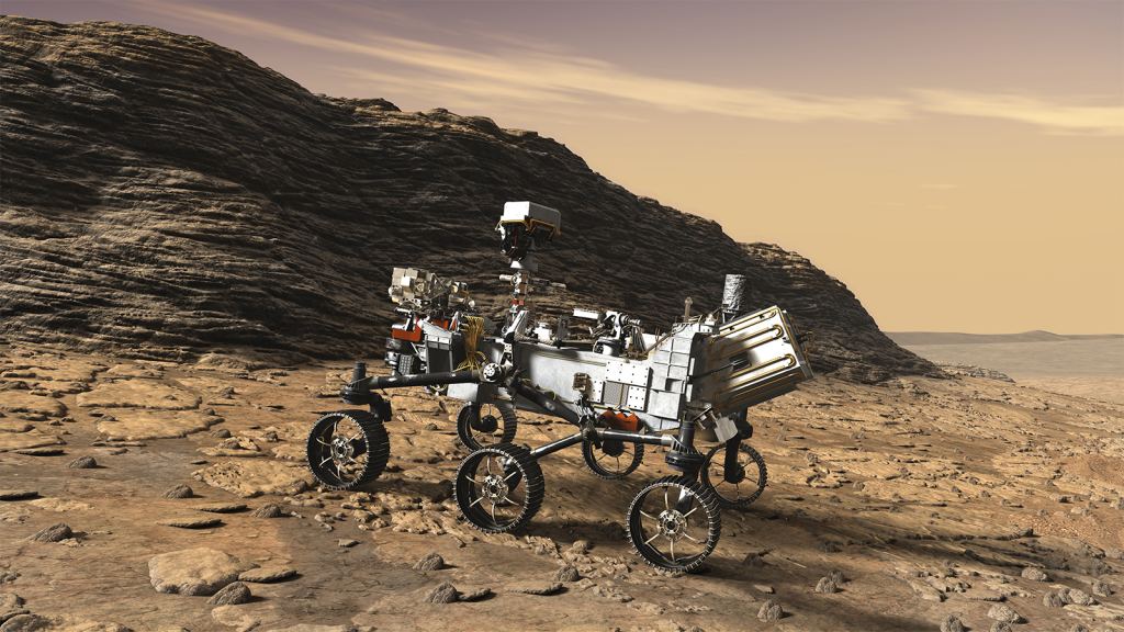 El concepto de este artista muestra un primer plano del rover Mars 2020 de la NASA que estudia un afloramiento de roca sedimentaria en capas.  Crédito de la imagen: NASA/JPL-Caltech